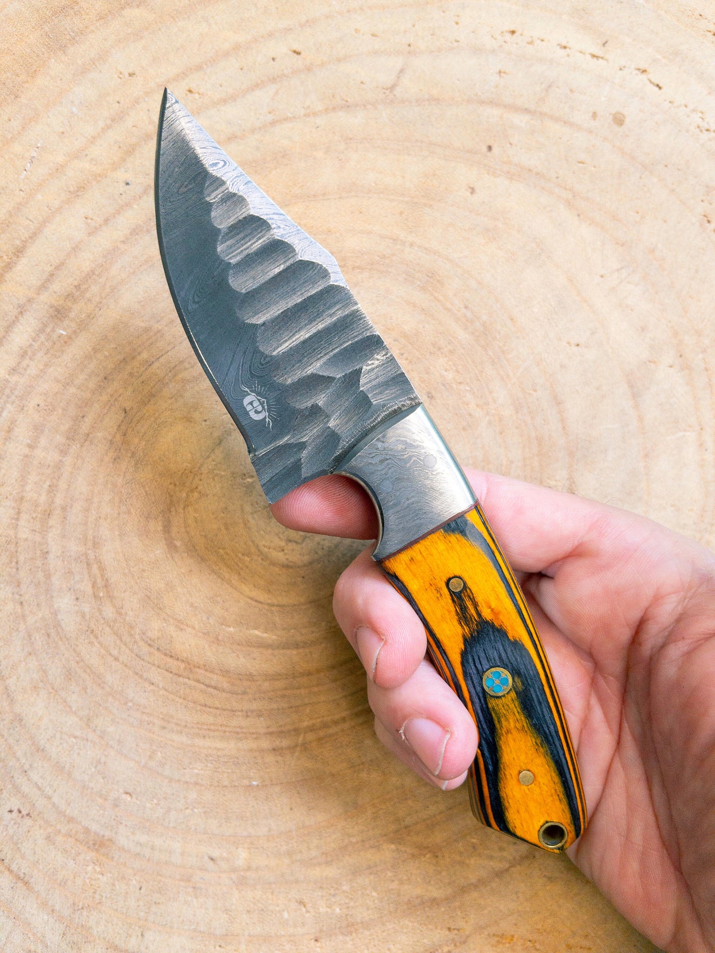 Damascus Hunting Knife, Rustic Hand Textured Blade, Orange and Black Carved Handle