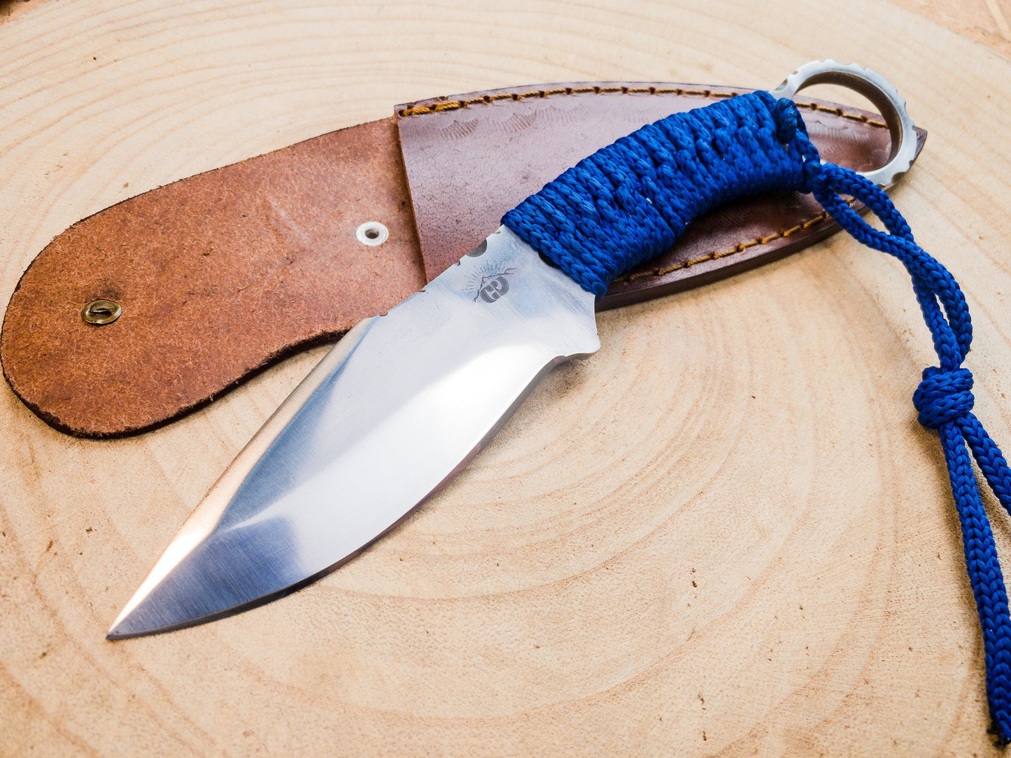 Hunting EDC knife handmade in 1085 steel, wrapped handle with finger wring hilt